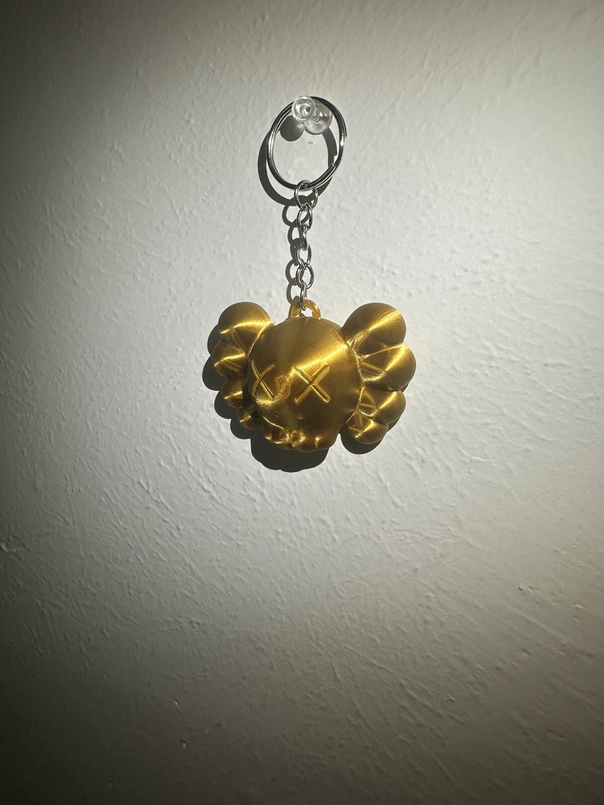 KAWS “Chum” Figure Keychain – Gold