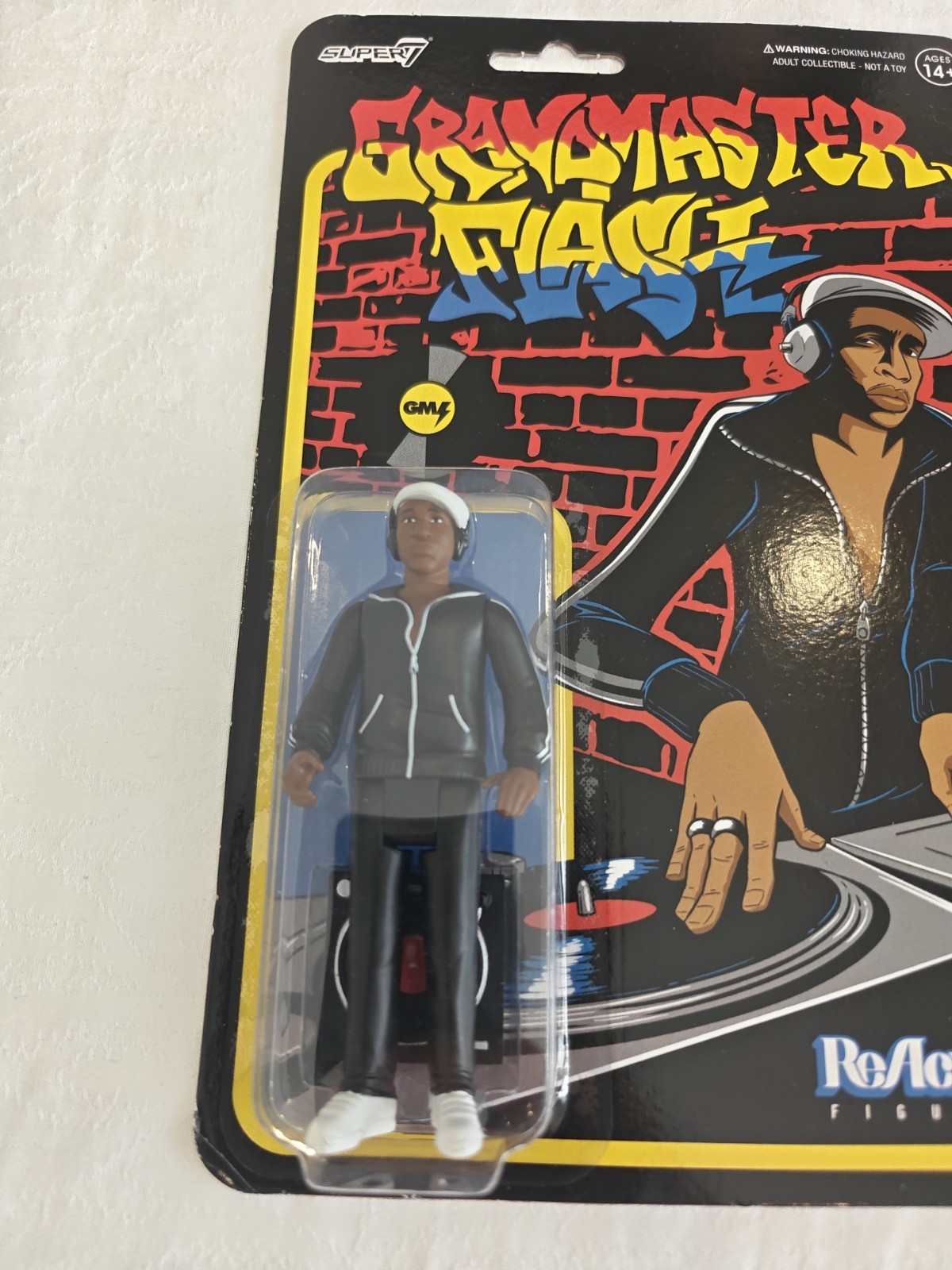 Grandmaster Flash Collectible 4&Prime; ReAction Figure with Accessory Black Age 14+