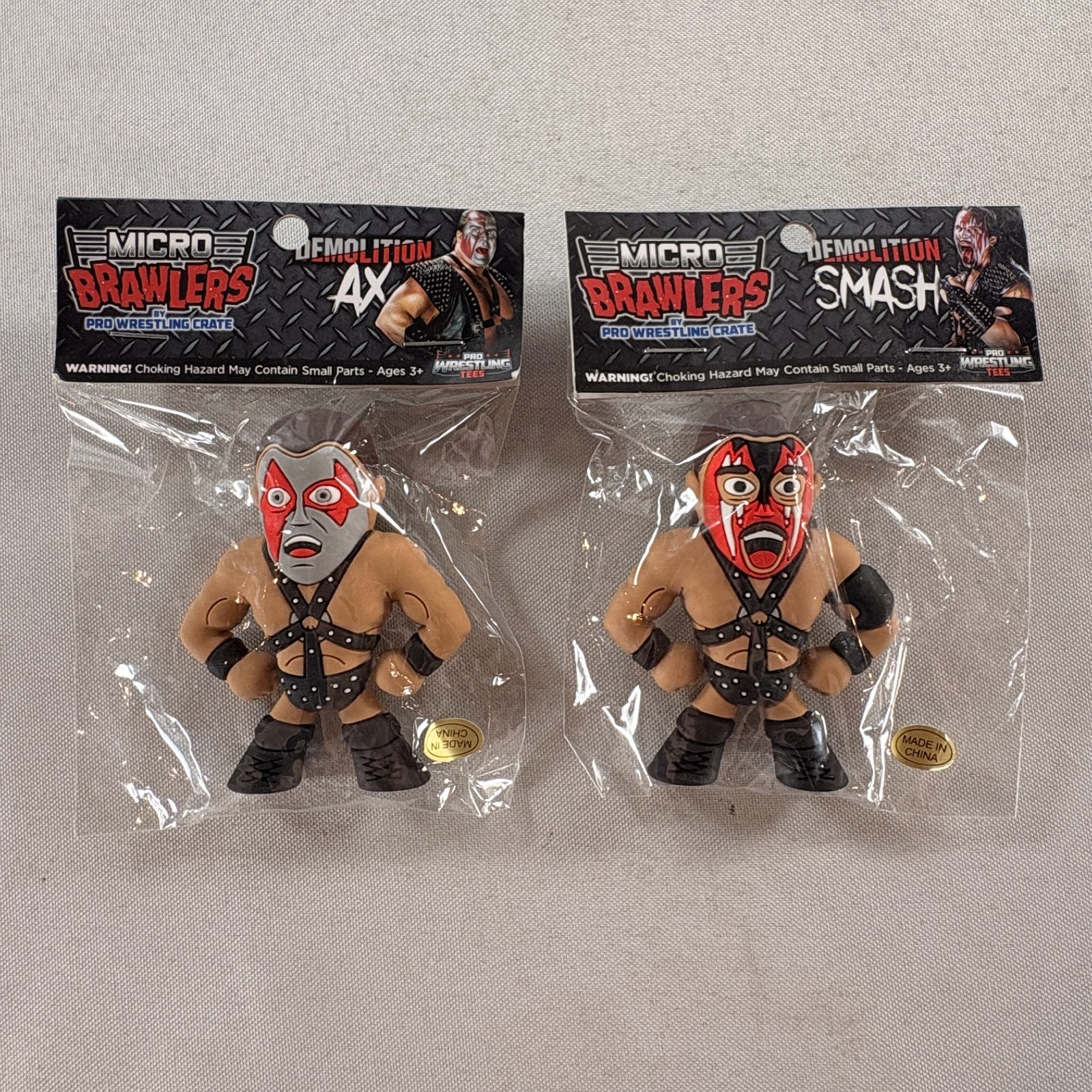 Lot of 2 New/Sealed Micro Brawler Figures: Demolition Ax & Smash wwf
