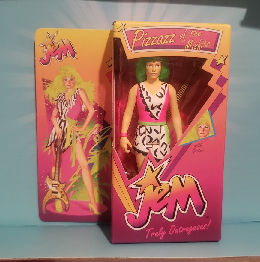 SDCC22 Jem & The Holograms Pizzaz (Neon Retro Box) 3 3/4 inch ReAction Figure