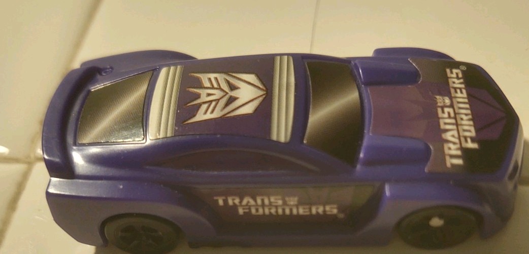 HASBRO 2011 PURPLE TRANSFORMERS LOOSE PLASTIC MODEL CAR DECEPTICON! L36