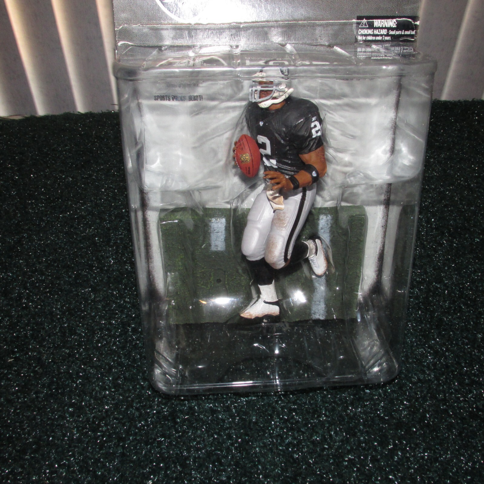 McFarlane 2008 JaMarcus Russell Oakland Raiders series 17 (rookie piece)