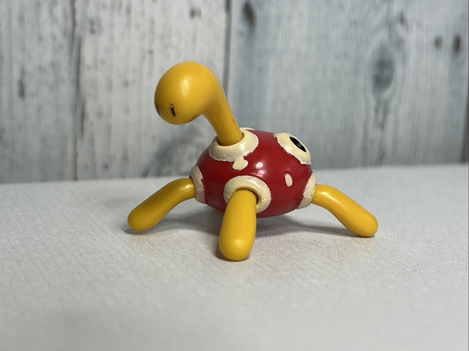 Pokemon Shuckle Figure Jazwares Nintendo Red Yellow Turtle Vinyl Figurine 2.25&Prime;