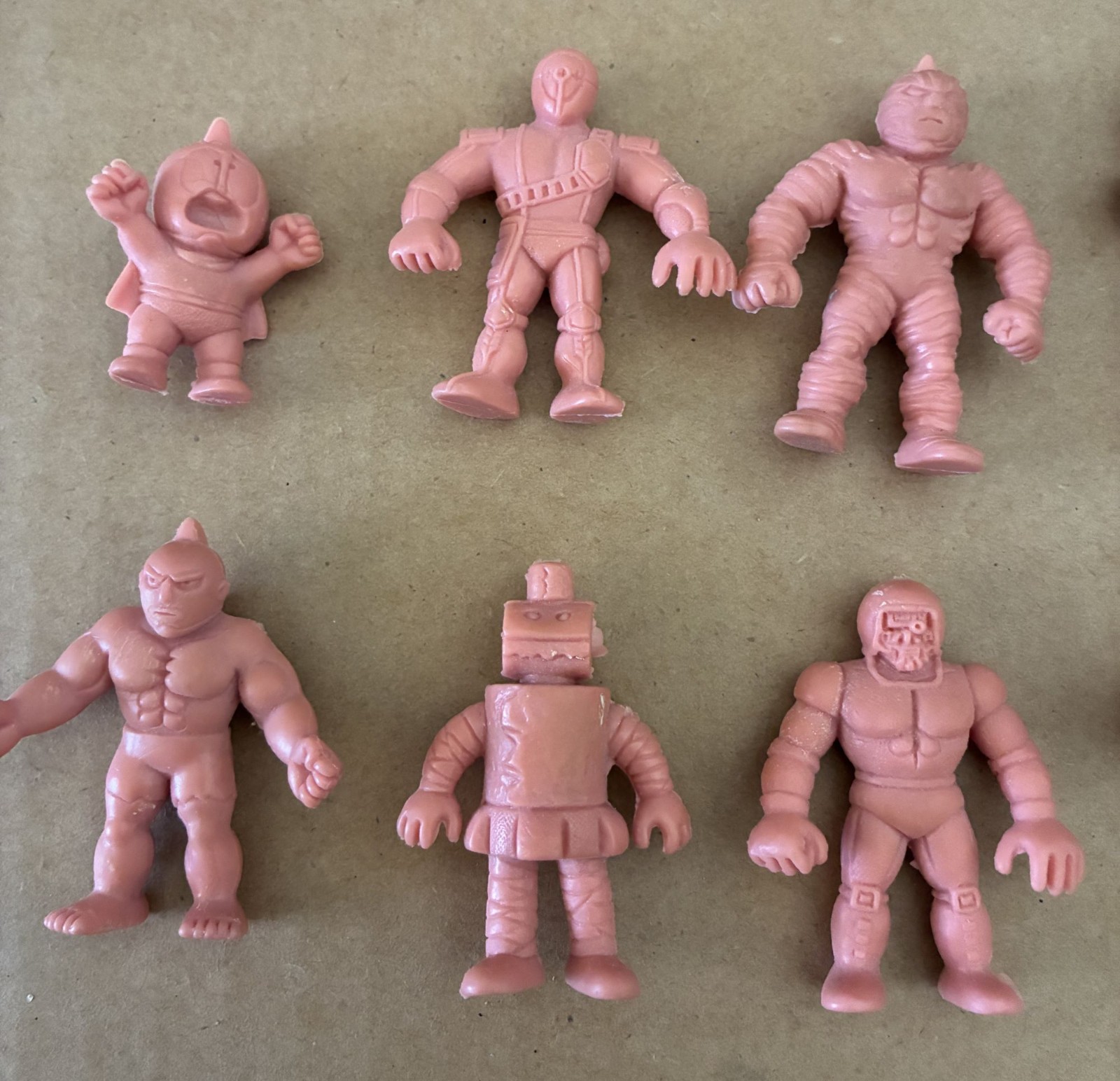 Vintage M.U.S.C.L.E. figures with original Trashcan package