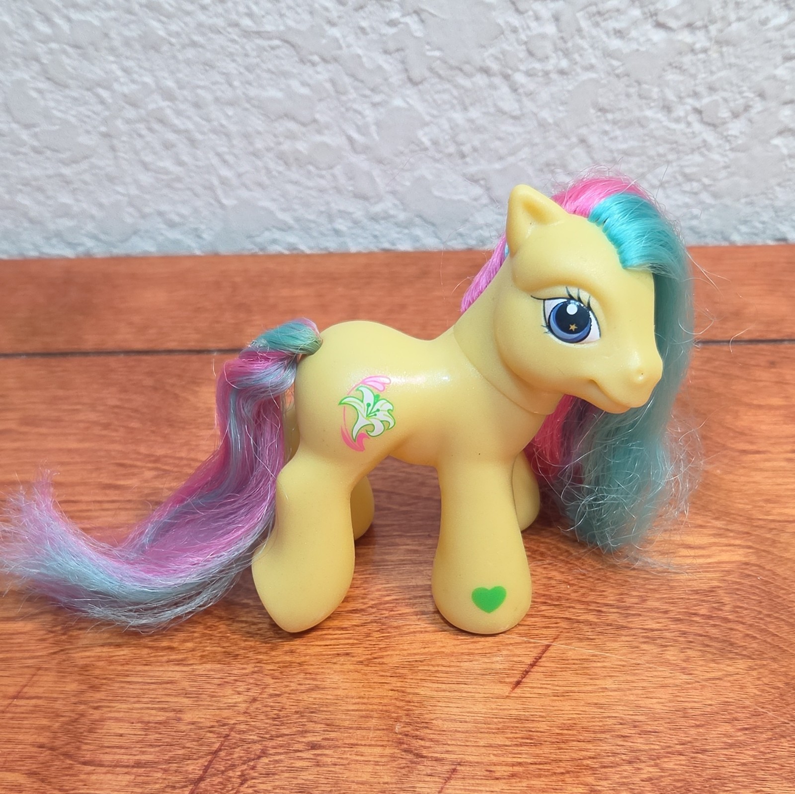 My Little Pony Yellow Horse Figurine Pink Blue Purple Hair Green Heart Hoof