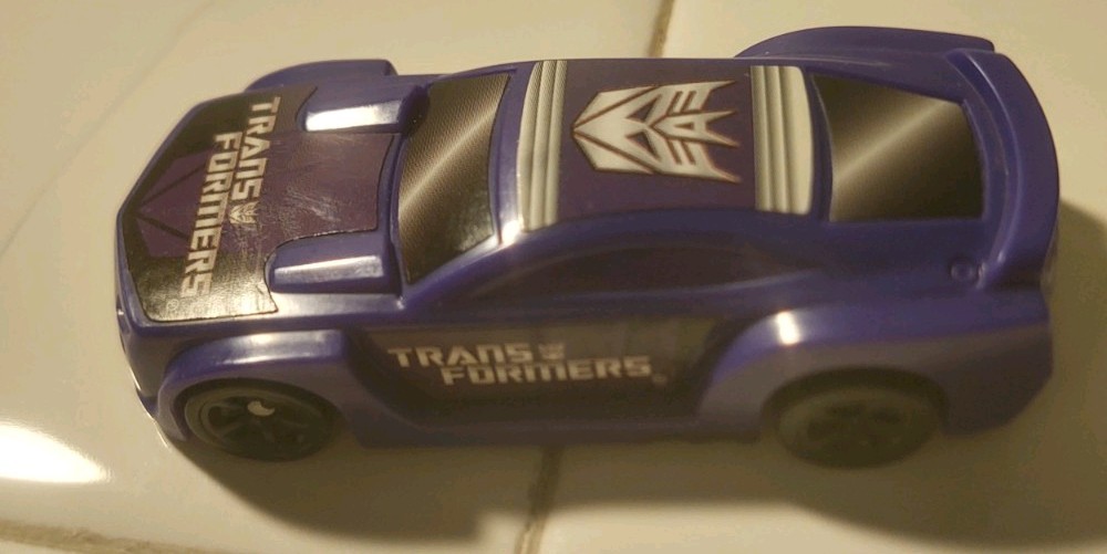 HASBRO 2011 PURPLE TRANSFORMERS LOOSE PLASTIC MODEL CAR DECEPTICON! L36