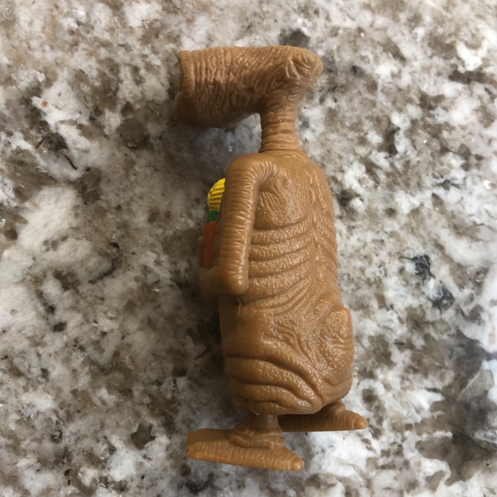 Vintage 1982 E.T. Extra Terrestrial Wind Up Toy Alien Holding Flowers Works