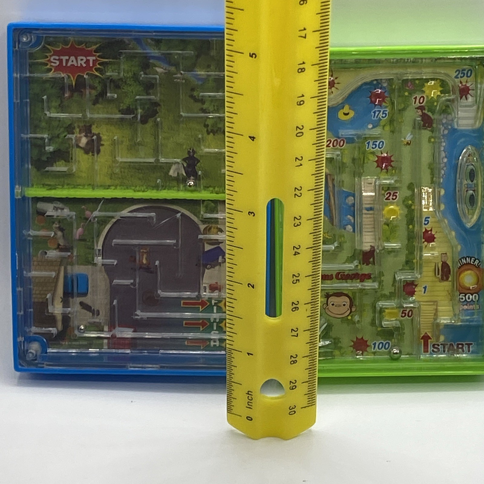 UIVERSAL STUDIOS CURIOUS GEORGE Monkey Maze Handheld Game & Over The Hedge