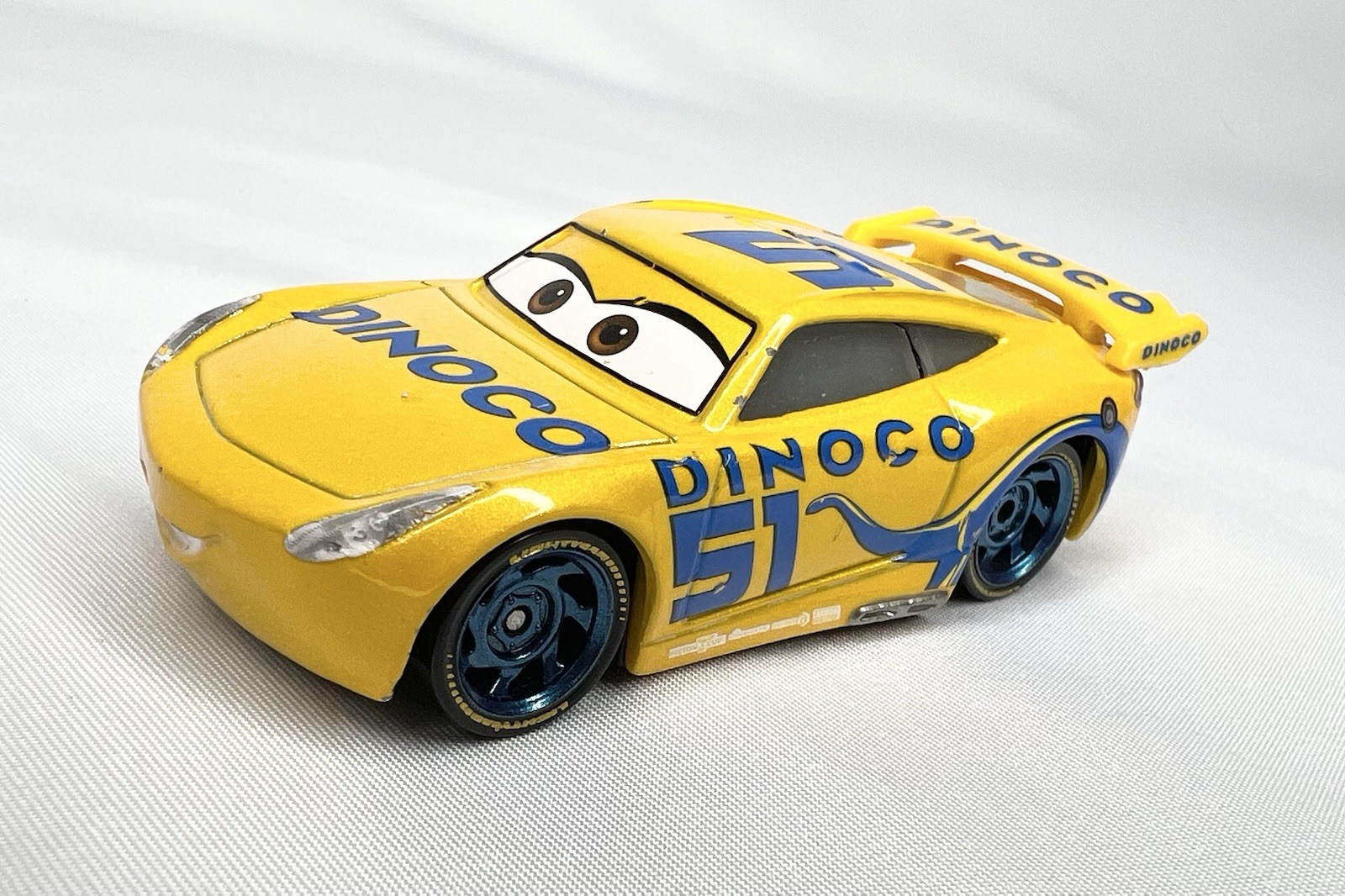 Disney Pixar Cars Dinoco 51 Cruz Ramirez Yellow Die-cast 1:55