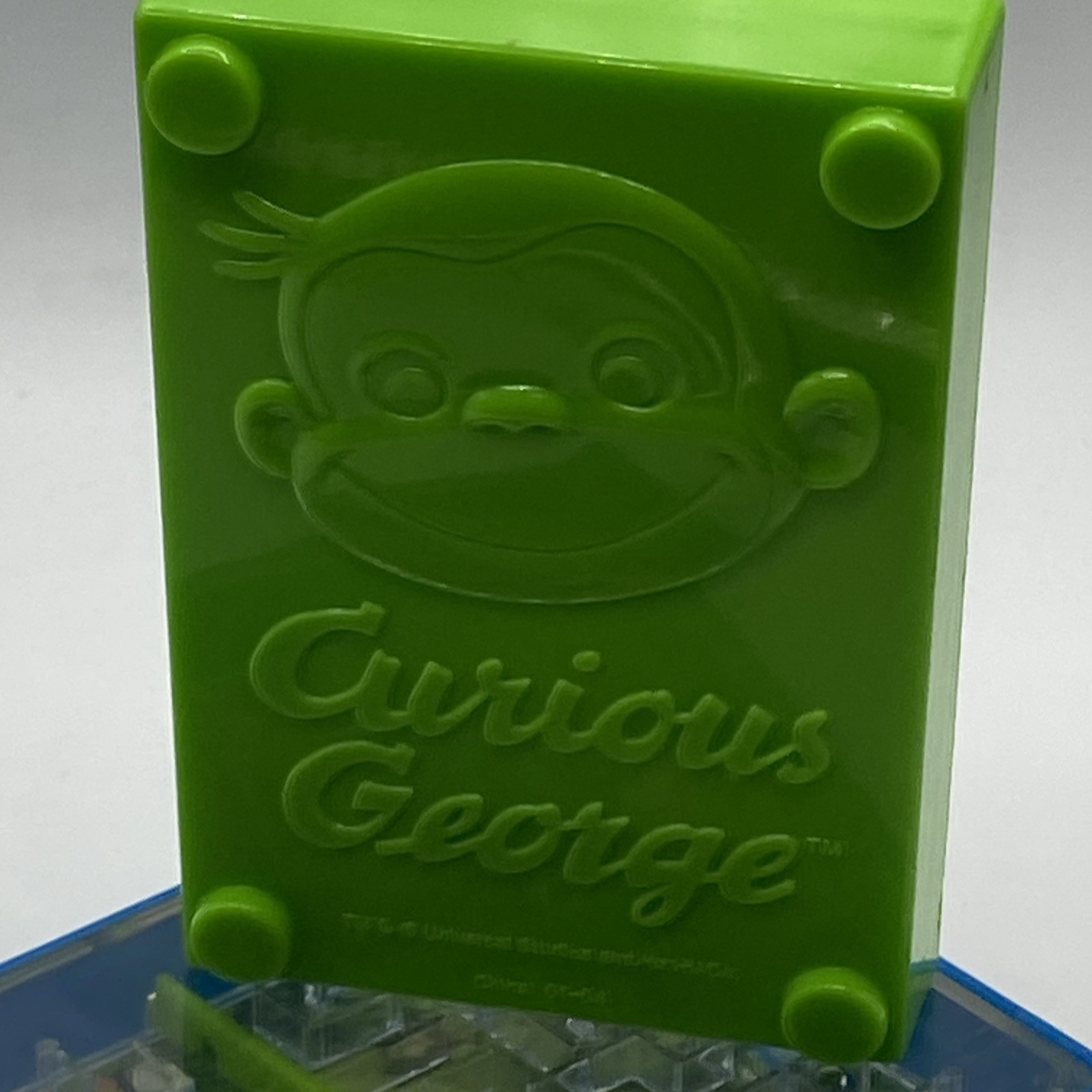 UIVERSAL STUDIOS CURIOUS GEORGE Monkey Maze Handheld Game & Over The Hedge