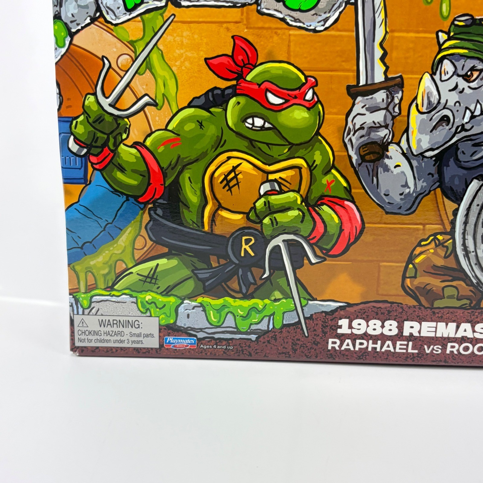 TMNT 1988 Remastered Raphael vs Rocksteady Playmates Action Figure 2-Pack N Hand