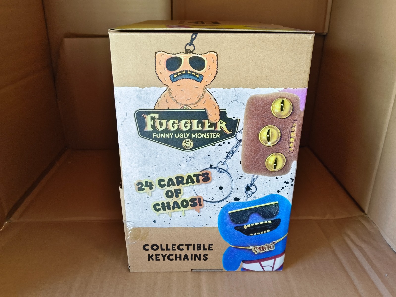 Case Of 24 Pieces Fuggler Funny Ugly Monster Collectible Keychains Gold Edition