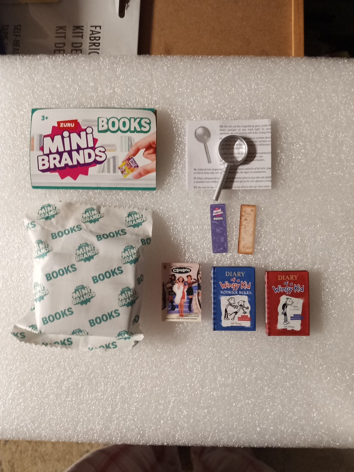ZURU MINI BRAND BOOKS LOT RARE CLUELESS COMMONS DIARY OF A WIMPY KID