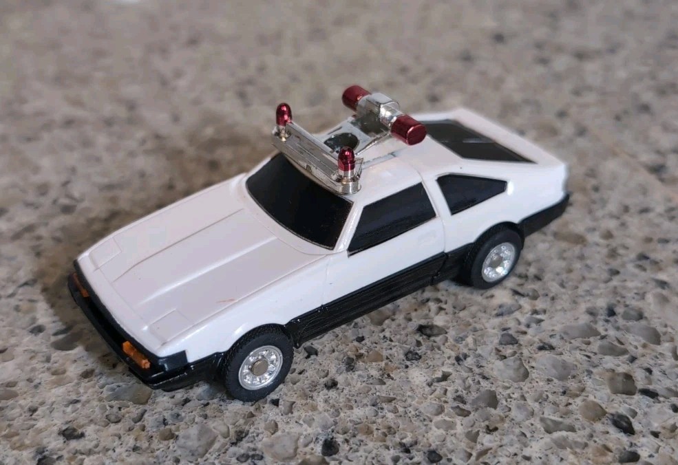 Vintage Tonka GoBots Figure 1985 PUZZLER #1 JIGSAW Police White Car. Great Shape