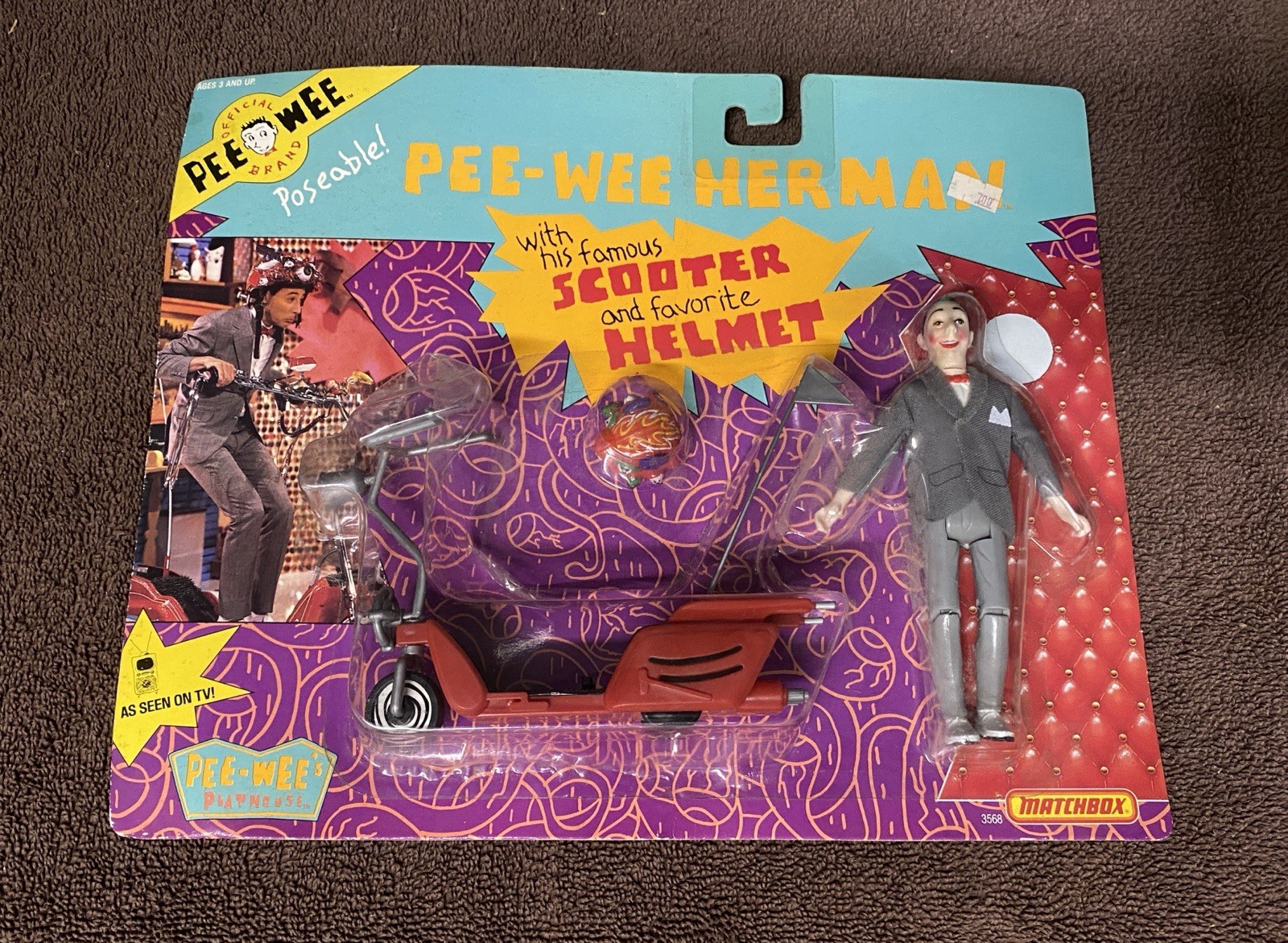 NEW SEALED IN PACKAGE PEE-WEE HERMAN WITH HIS FAMOUS SCOOTER AND FAVORITE HELMET
