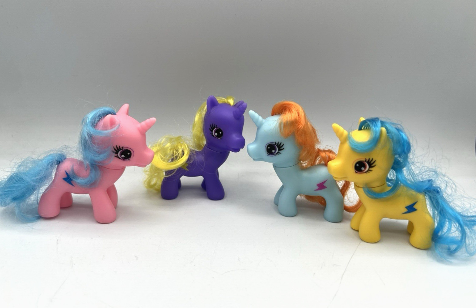 Gi Go Wonder Pony Small Pony 4 Figure Toy Lot Pink Purple Blue Yellow 5-10-B1A