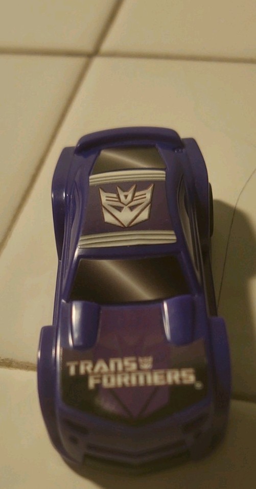HASBRO 2011 PURPLE TRANSFORMERS LOOSE PLASTIC MODEL CAR DECEPTICON! L36