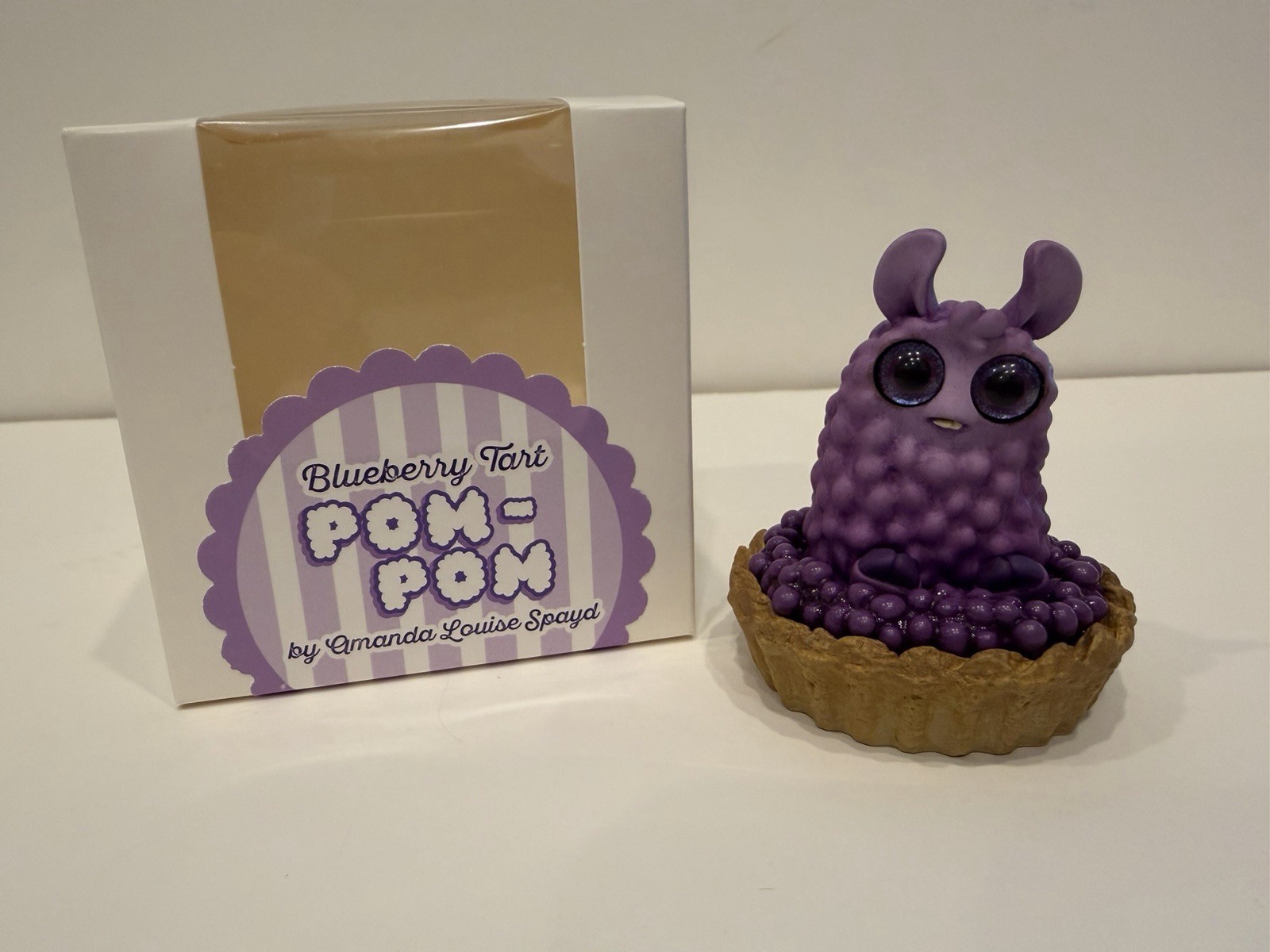 “Blueberry Tart” Pom-Pom By Amanda Louis Spayd – Hand Painted – Bindlewood