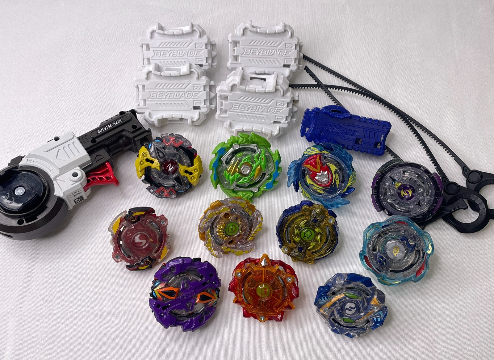 Lot Of 11 Beyblade Battling Tops And Accessories Launchers