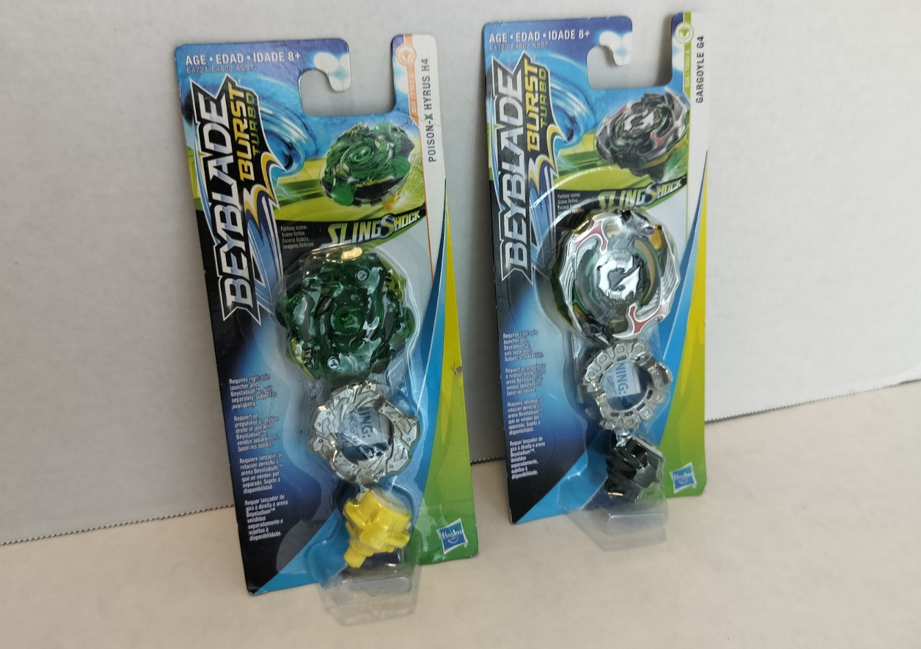 2x Lot Beyblade Burst Turbo Slingshock Gargoyle G4 & Poison-X Hyru Battling Tops