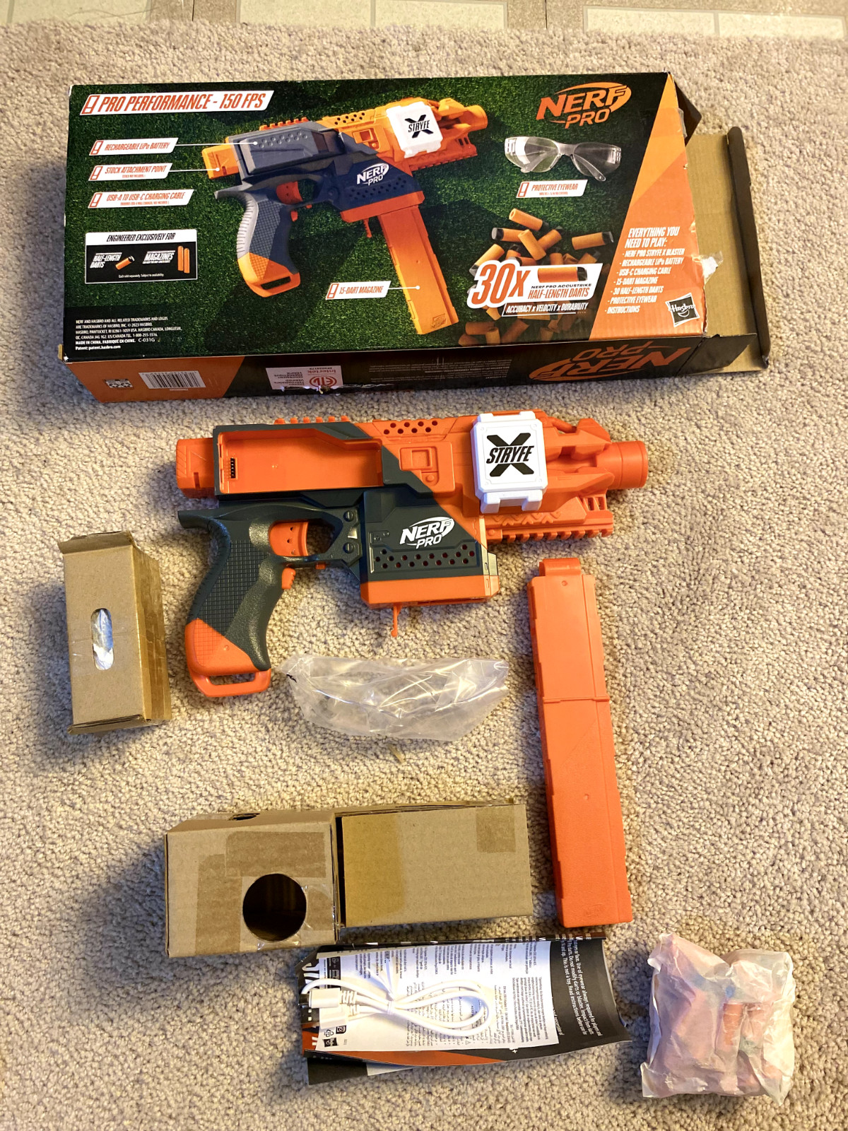 Nerf Pro Stryfe X Dart Blaster: Battery, 30 HL Darts, Magazine, Glass & Charger.