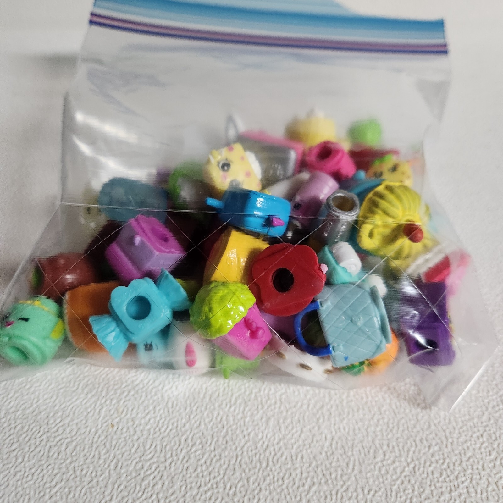 Bag of Mini Shopkins mixed Lot of 50 selections from different Seasons