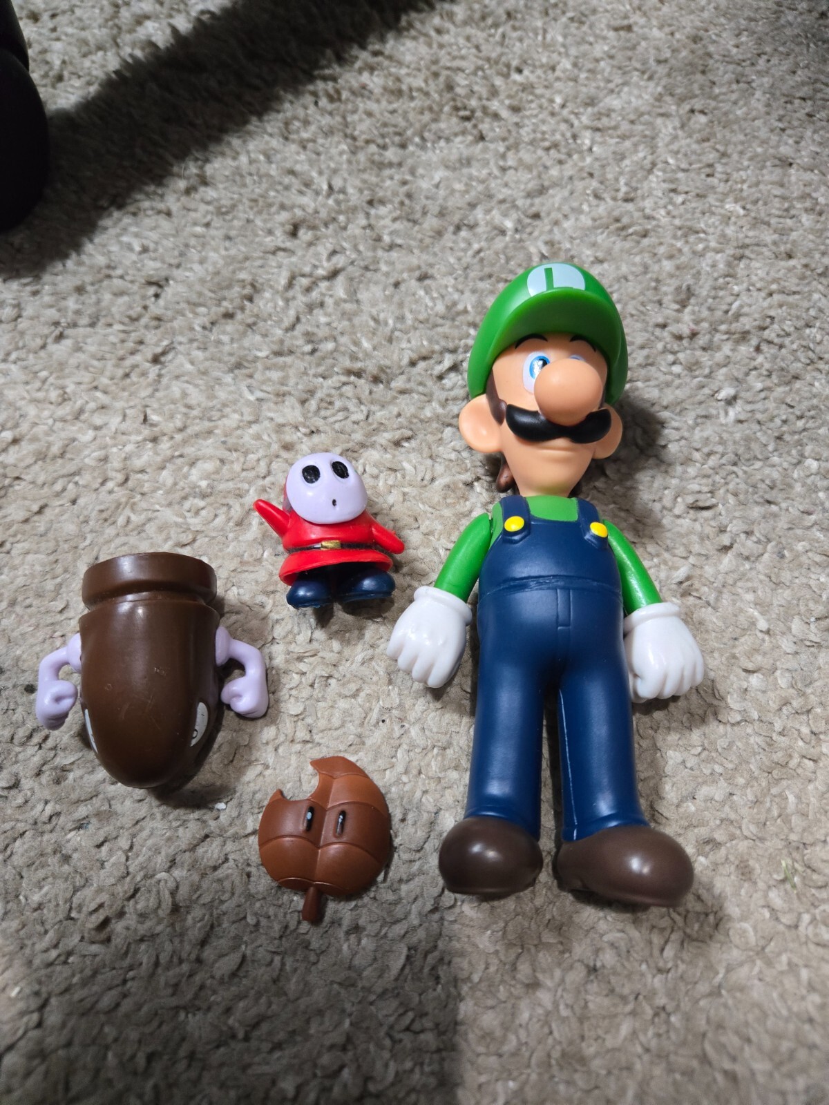 Nintendo Mario Figures Lot of 4 – Luigi, Shy Guy, Bullet Bill, Power Up Leaf