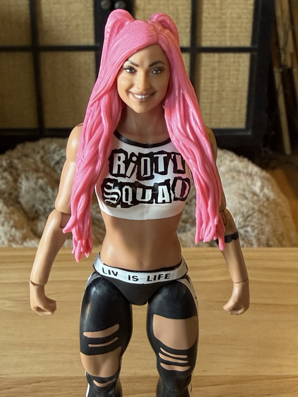 One recently opened loose WWE Liv Morgan action figure from 2020 by Mattel.