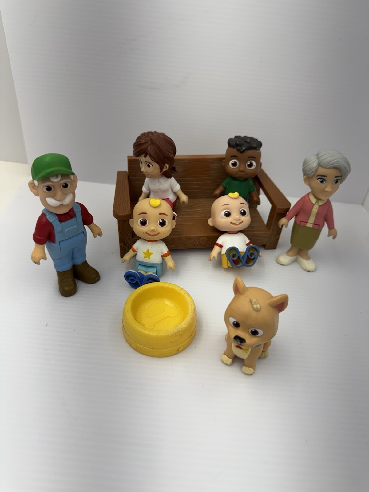 Cocomelon figures lot Of 7 With Bench And Dog Bowl