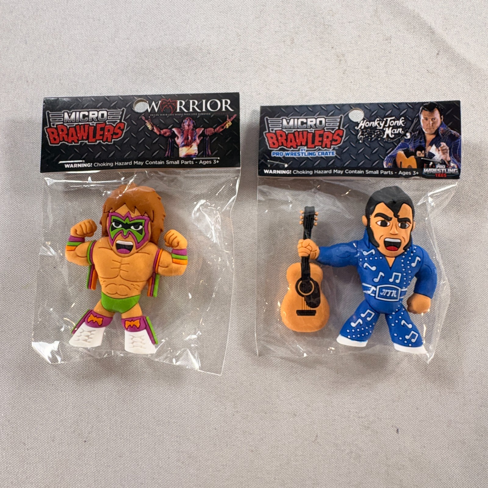 Lot of 2 New/Sealed Micro Brawler Figures: Ultimate Warrior & Honky Tonk Man wwf
