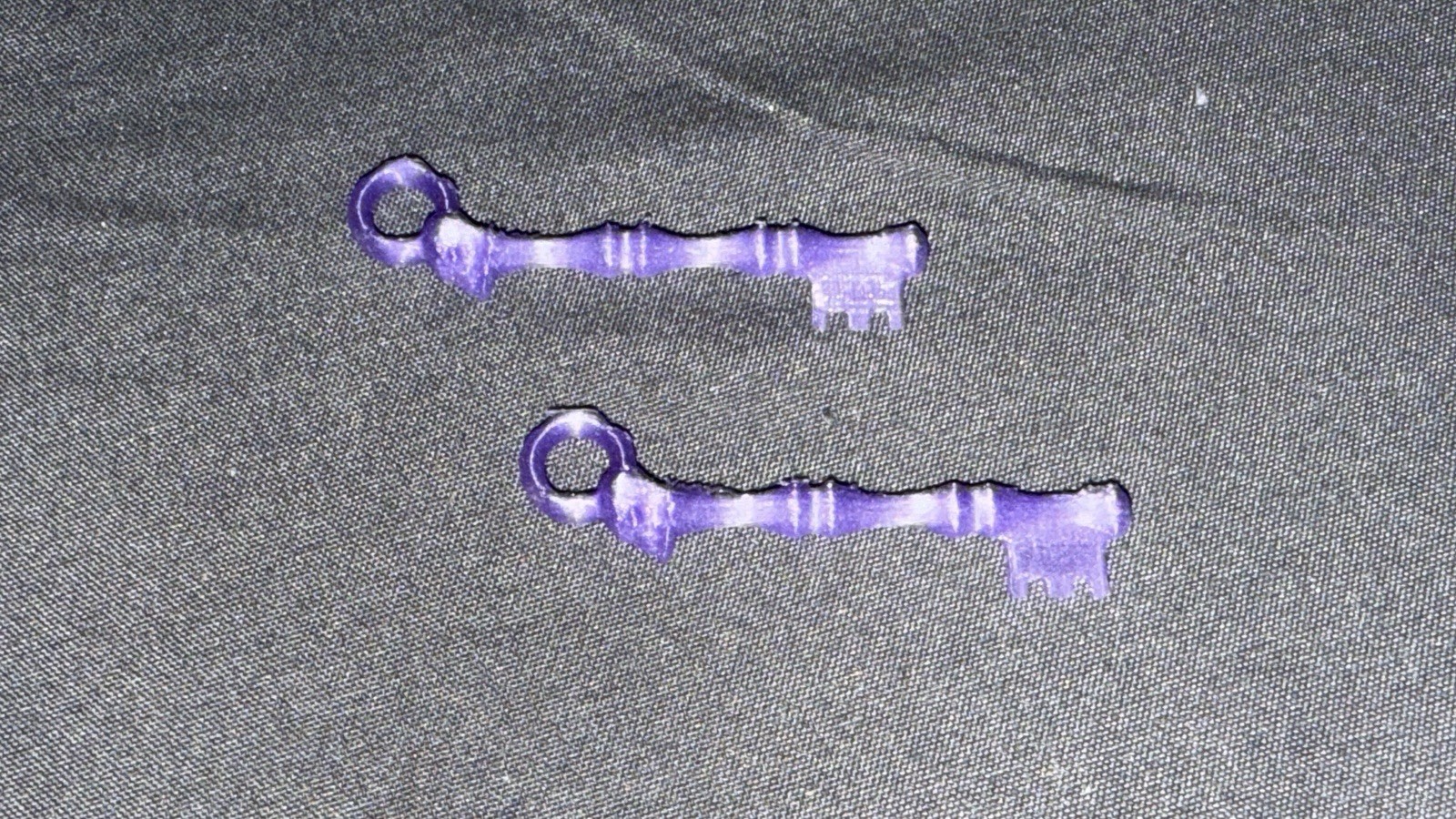 Two GITD purple Custom Skeleton Keys by He-Bro