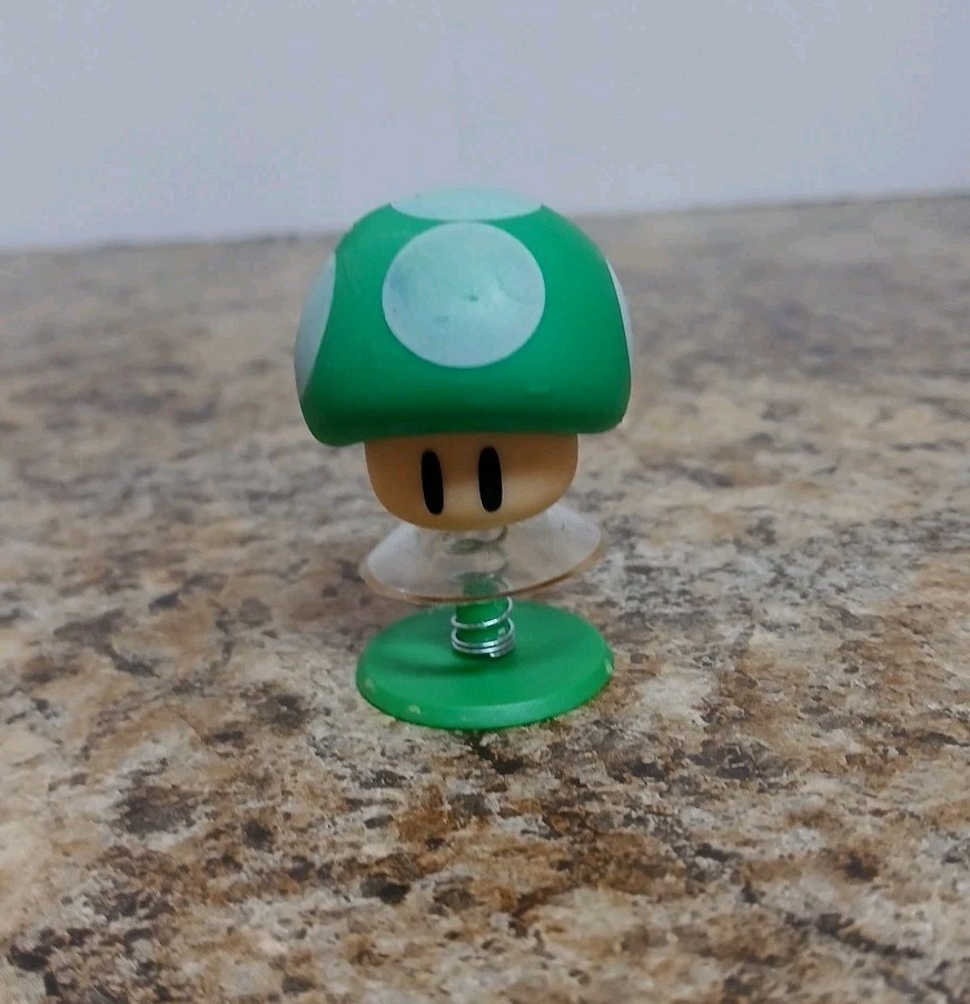 DesignWares Inc.: Nintendo Super Mario Bros. – 1up Mushroom Pop Up Toy