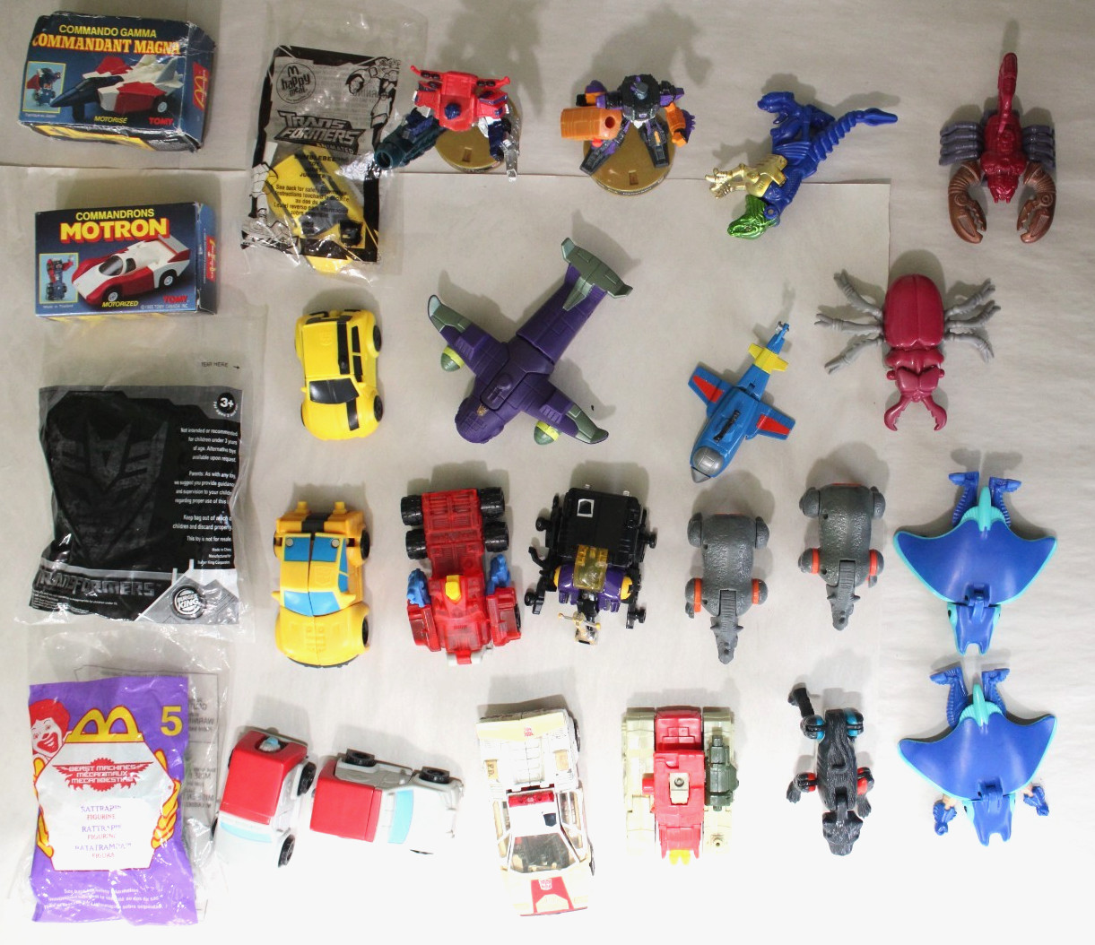 Mix of 25 McDonald&rsquo;s Happy Meal Takara TRANSFORMERS COMMANDRONS Toy Figures