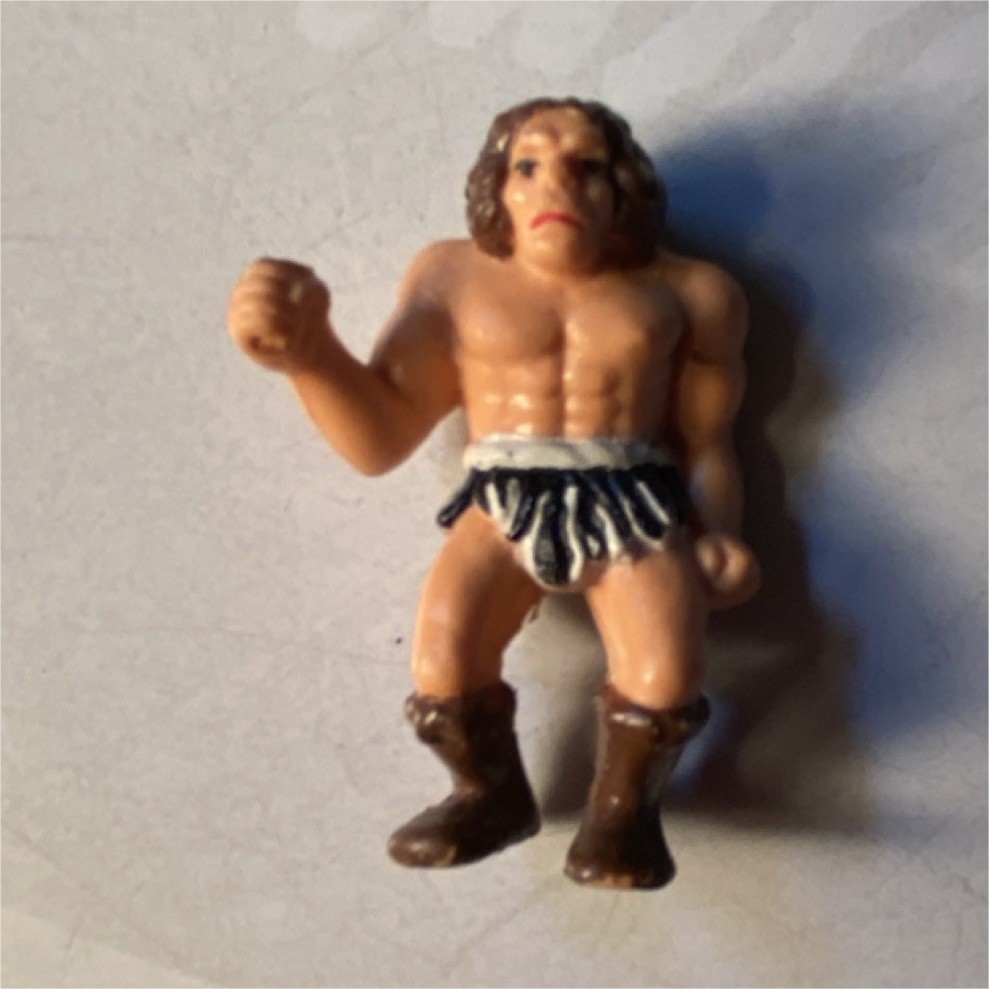 Caveman Figurine Small Brown Boots Black White Skirt Plastic Less Than 5 in