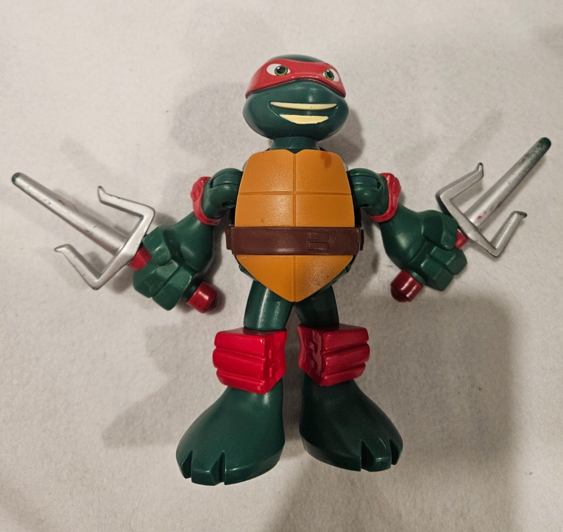 Teenage Mutant Ninja Turtles Raphael Action Figure Playmates Viacom