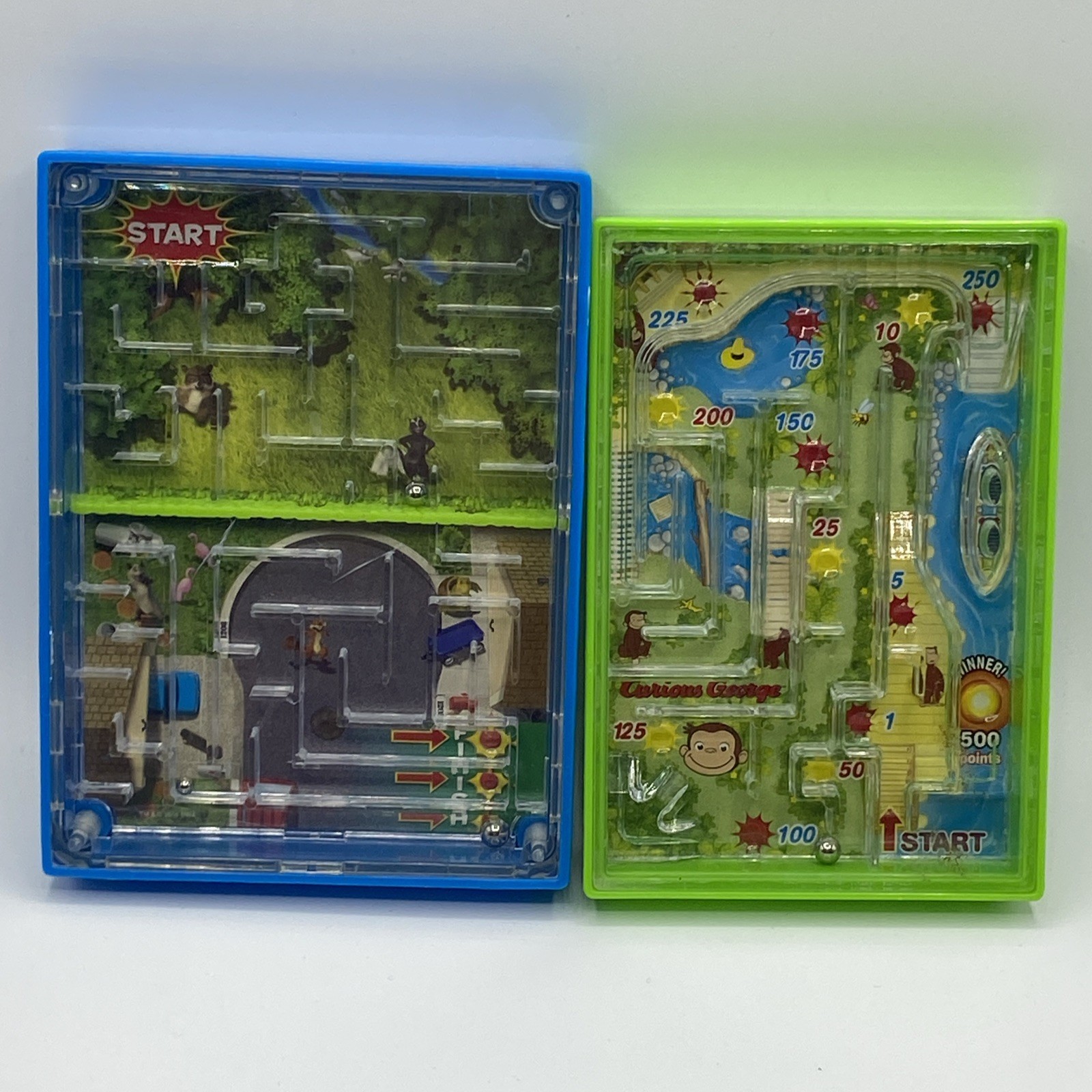 UIVERSAL STUDIOS CURIOUS GEORGE Monkey Maze Handheld Game & Over The Hedge