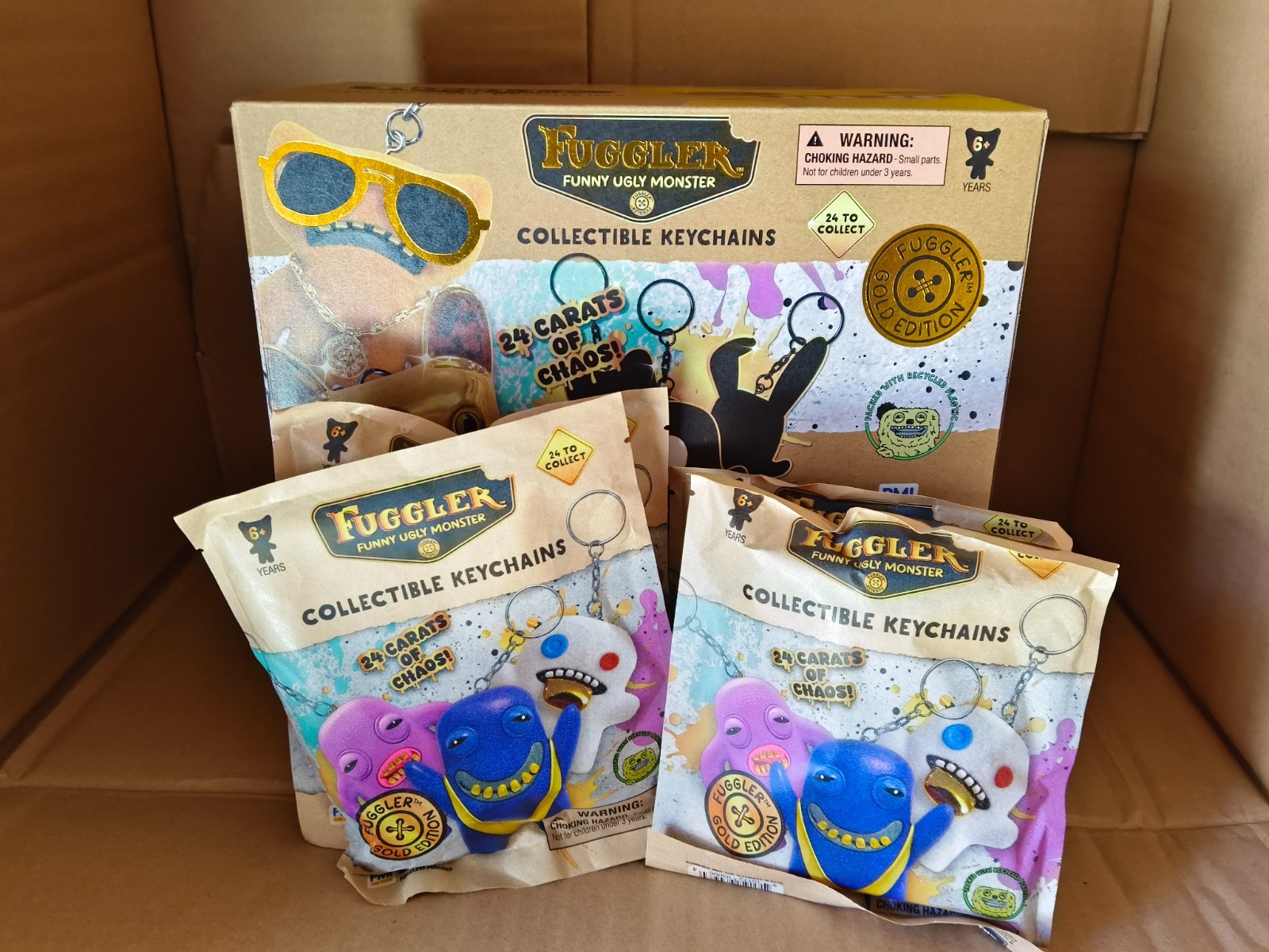 Case Of 24 Pieces Fuggler Funny Ugly Monster Collectible Keychains Gold Edition