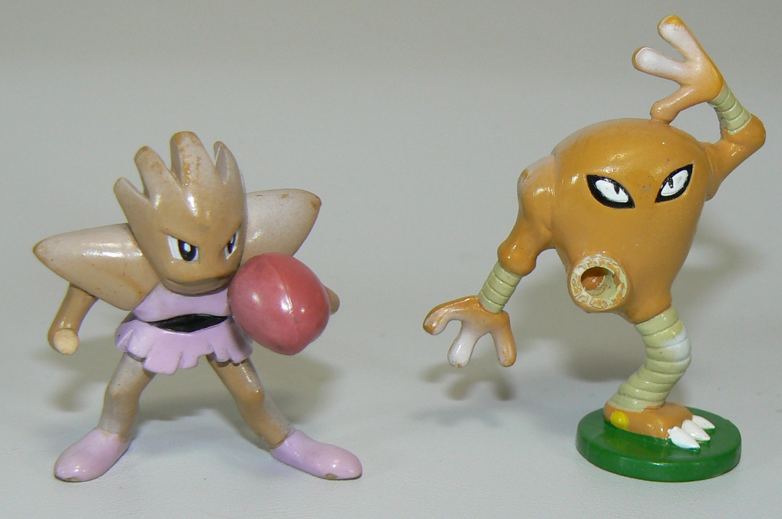Hitmochan and Hitmonlee stamped Tomy PVC Pokemon figure about 1.5 inches tall