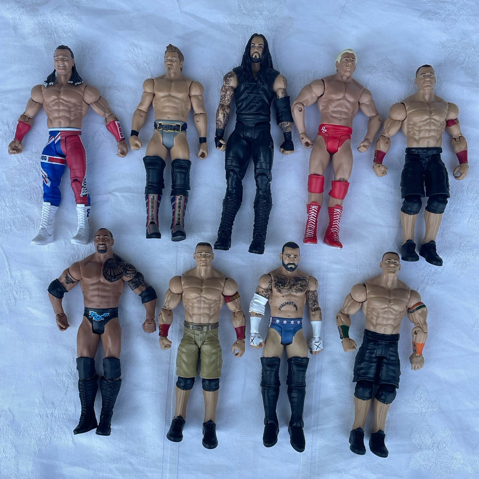 WWE Action Figures Lot of 9 Cena Undertaker Flair CM Punk Jericho Bulldog Rock