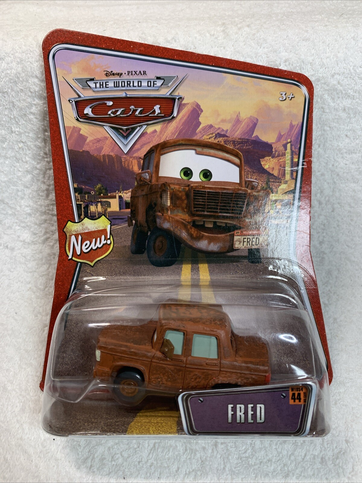 FRED #44 Diecast World Cars 2008 Disney Pixar Rusty Racing Fan Front Plate NEW