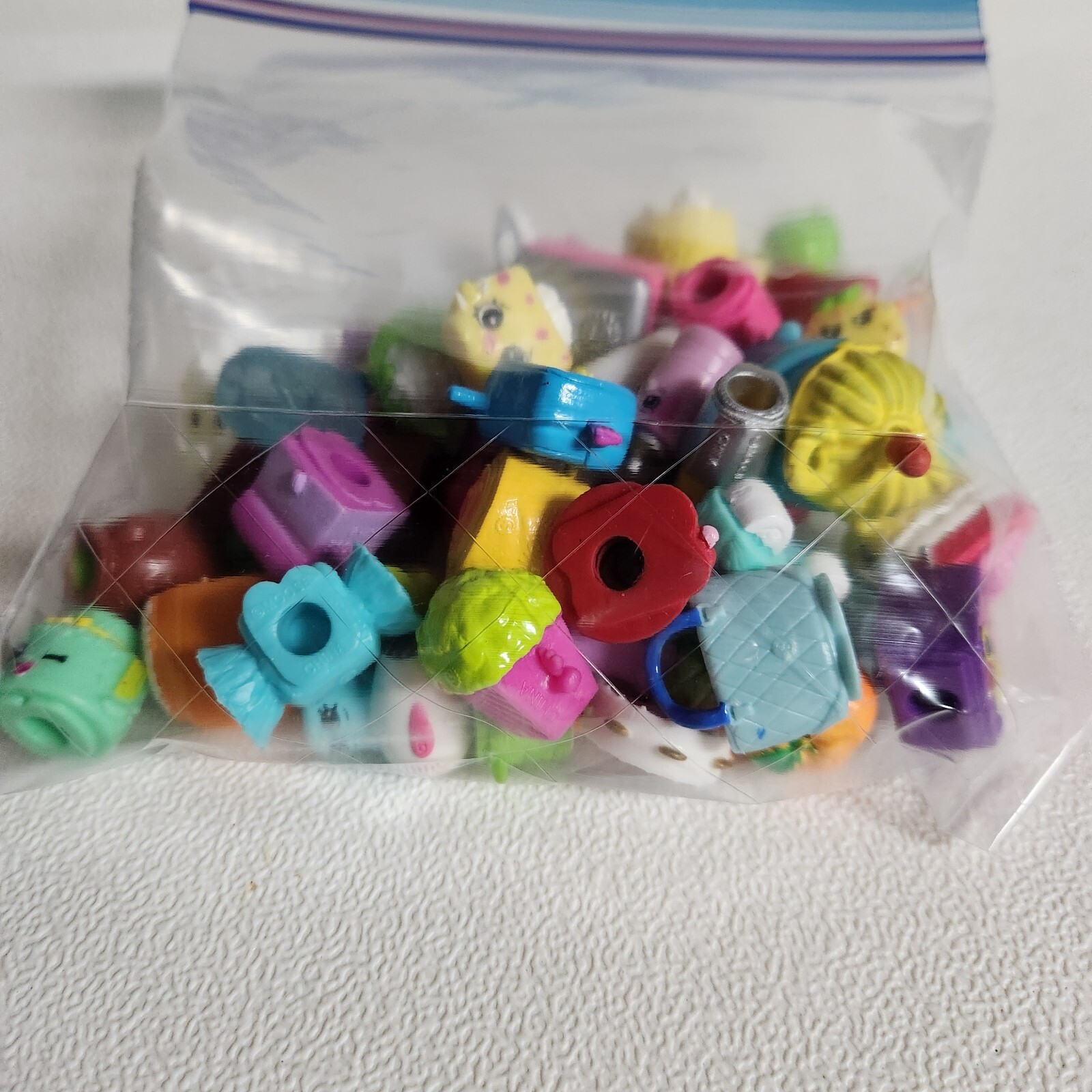 Bag of Mini Shopkins mixed Lot of 50 selections from different Seasons