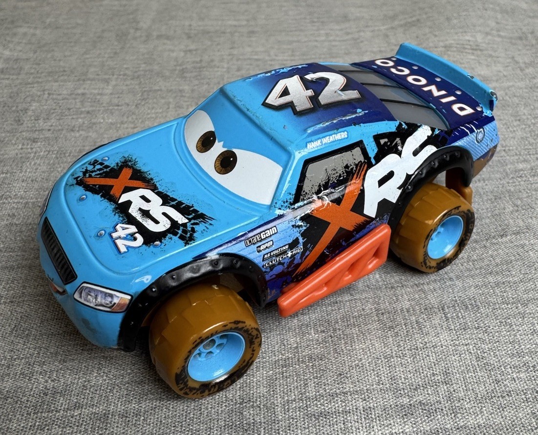 Disney Pixar Car Xtreme Racing Series CAL WEATHERS Mud Racing Dinoco #42