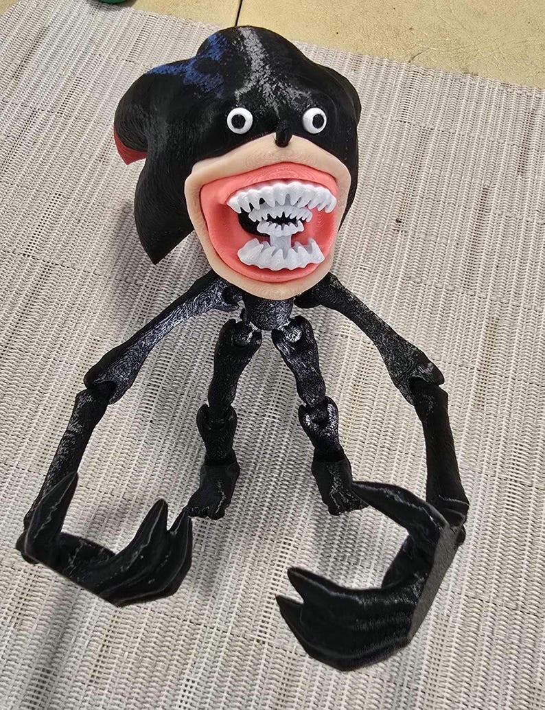 Shin Shadow Large 8&Prime; tall, 13&Prime; long Articulated Fidget toy glow in the dark