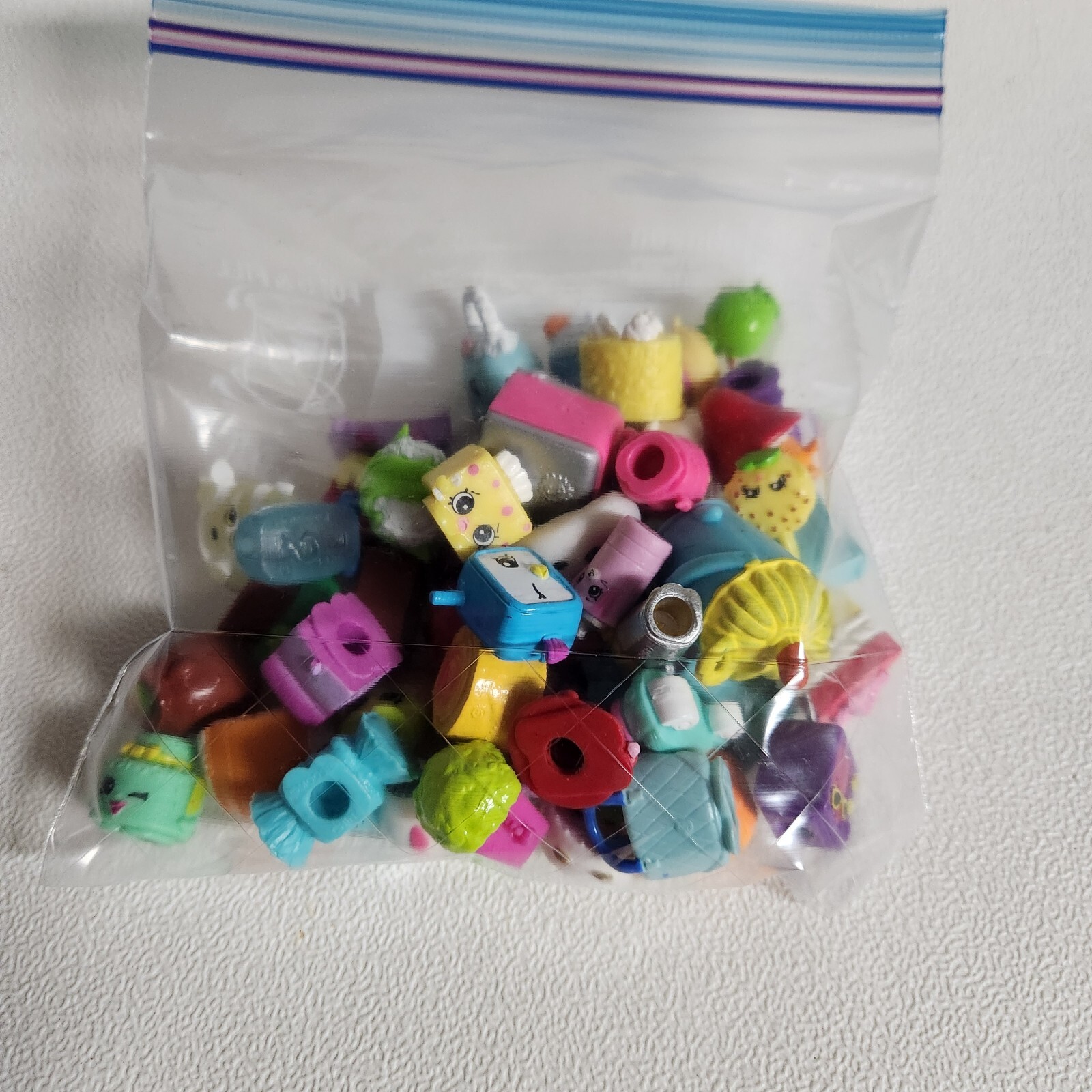 Bag of Mini Shopkins mixed Lot of 50 selections from different Seasons