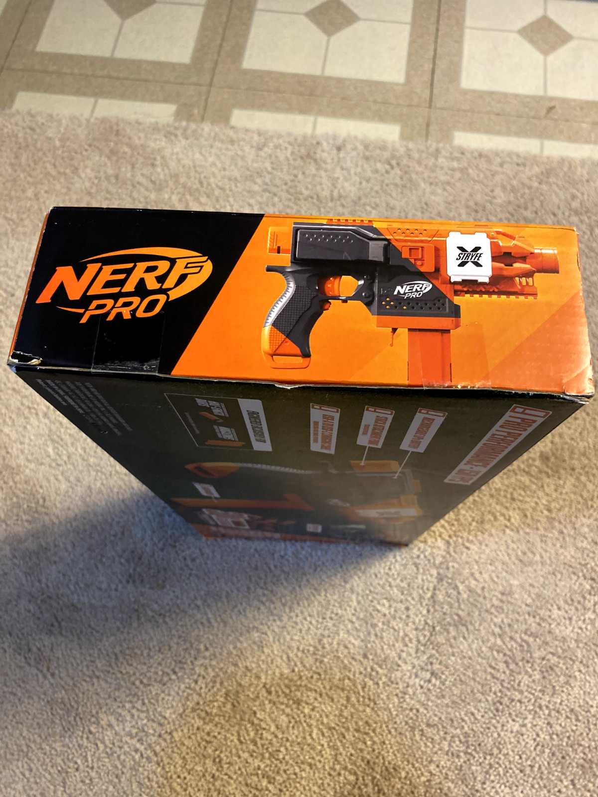 Nerf Pro Stryfe X Dart Blaster: Battery, 30 HL Darts, Magazine, Glass & Charger.