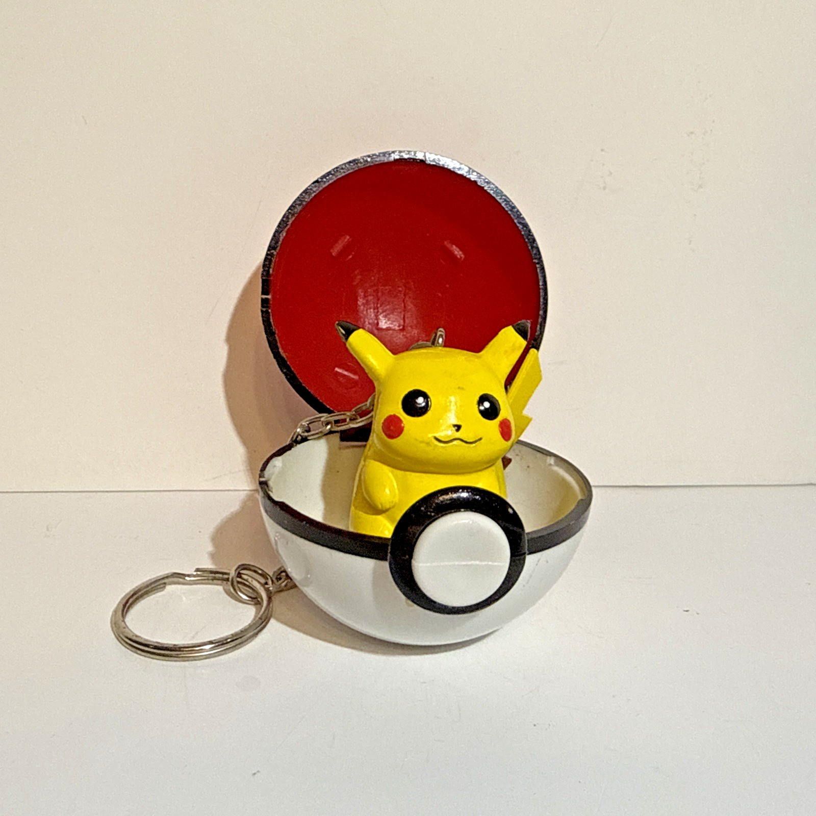 Pikachu (#025) 1999 Basic Fun BFI Pokémon Keychain Figure w/ Pokeball