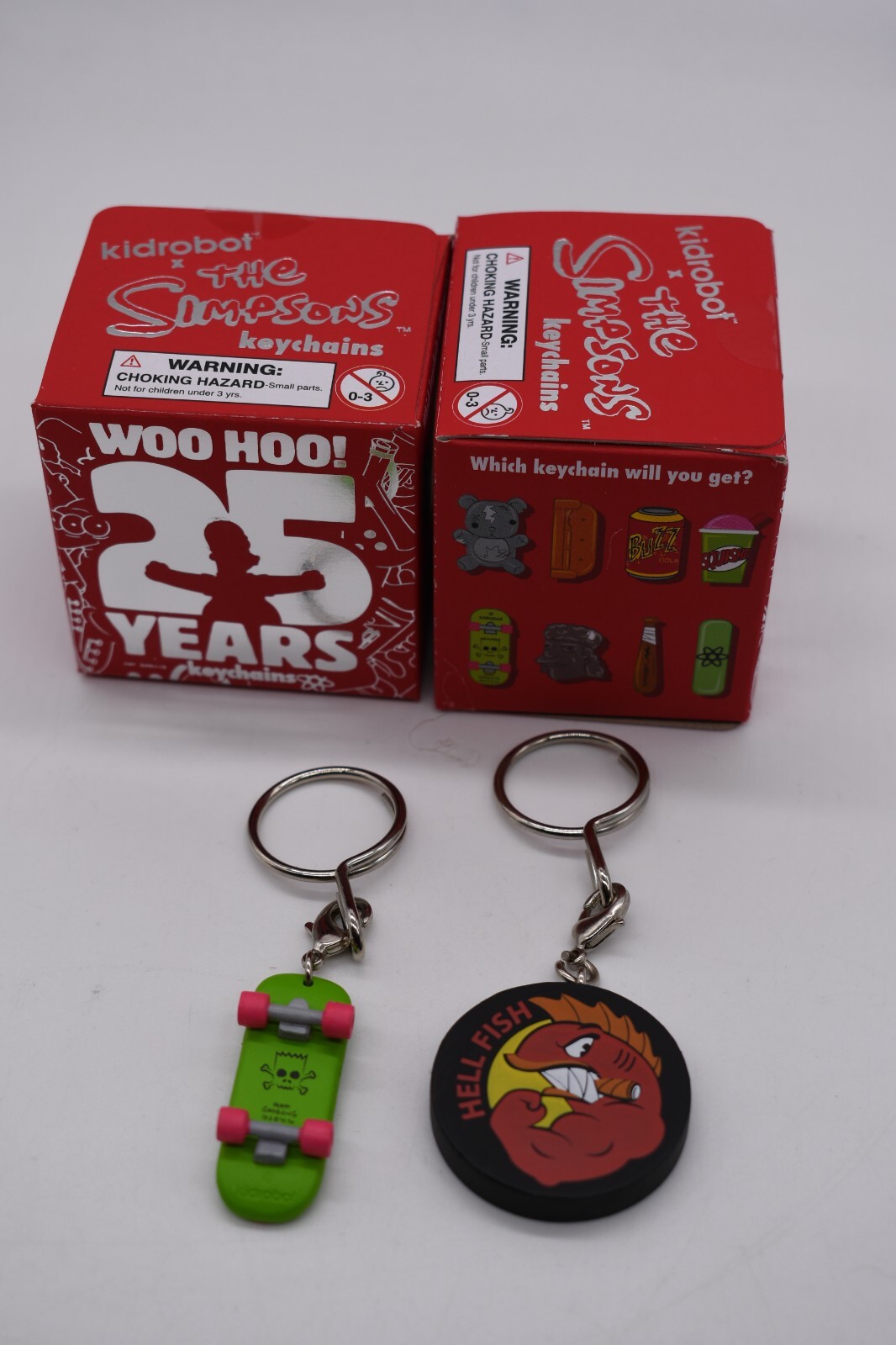 (2 Pack) The Simpsons: 25th Anniversary – Keychains – Hellfish & Skateboard -NEW