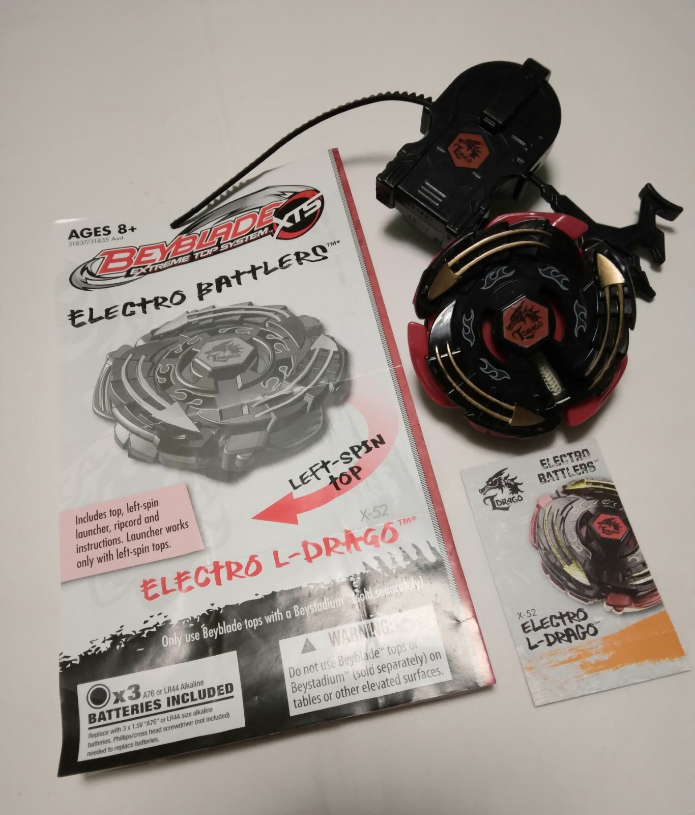 Beyblade Electro L-Drago X52 2011, left spin, used, age 8+
