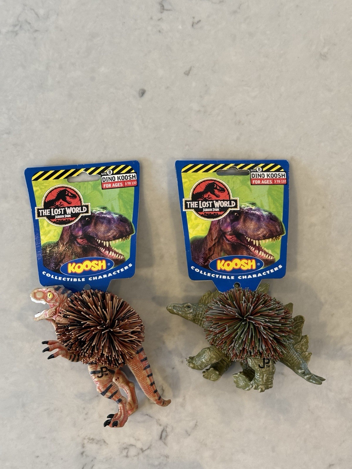 Lot of 2 Vintage 1997 The Lost World Dino Koosh , Velociraptor & Stegosaurus NEW