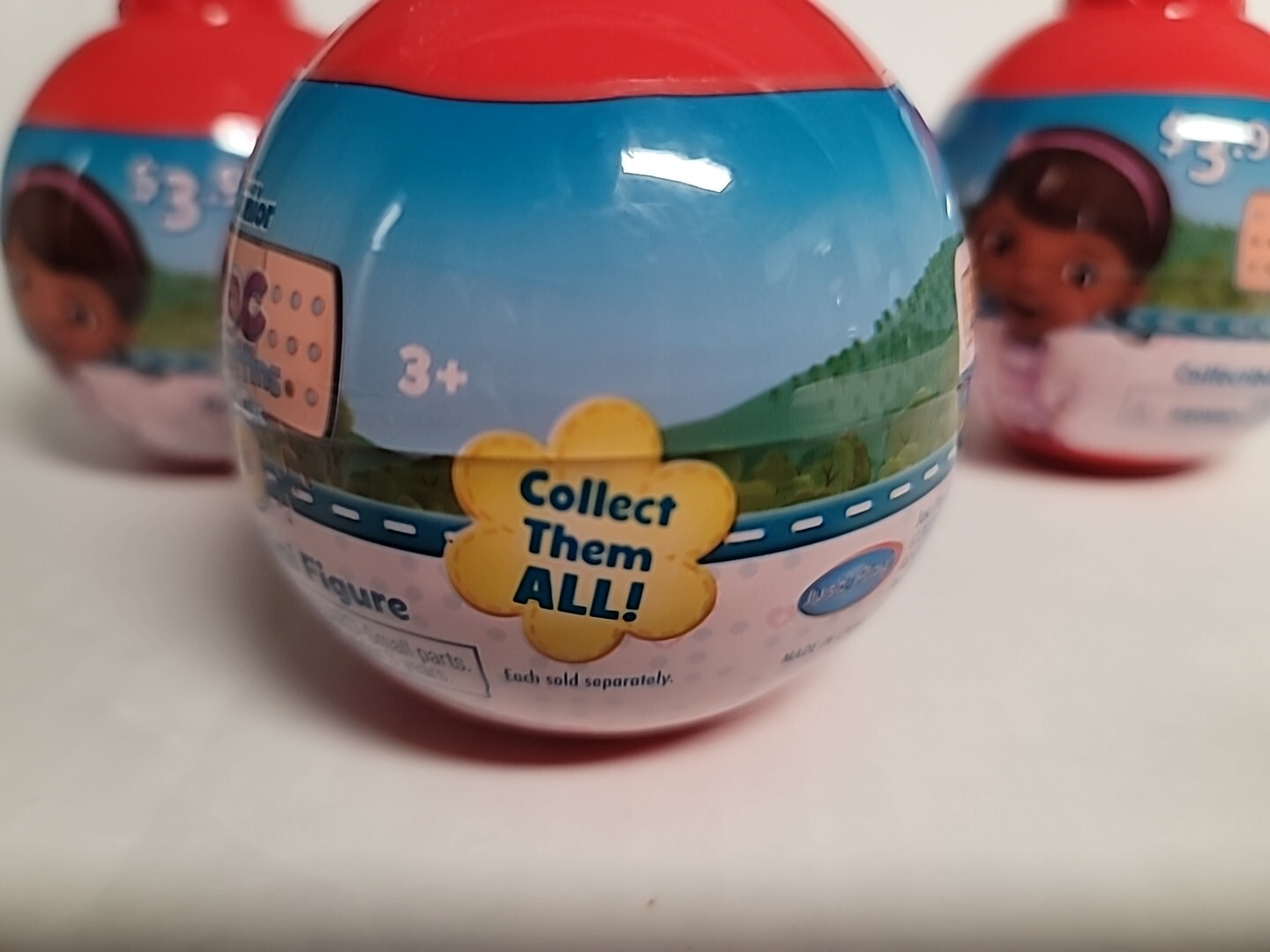 4~DISNEY JUNIOR DOC MCSTUFFIN PLASTIC ORNAMENT WITH MYSTERY MINI FIGURINE